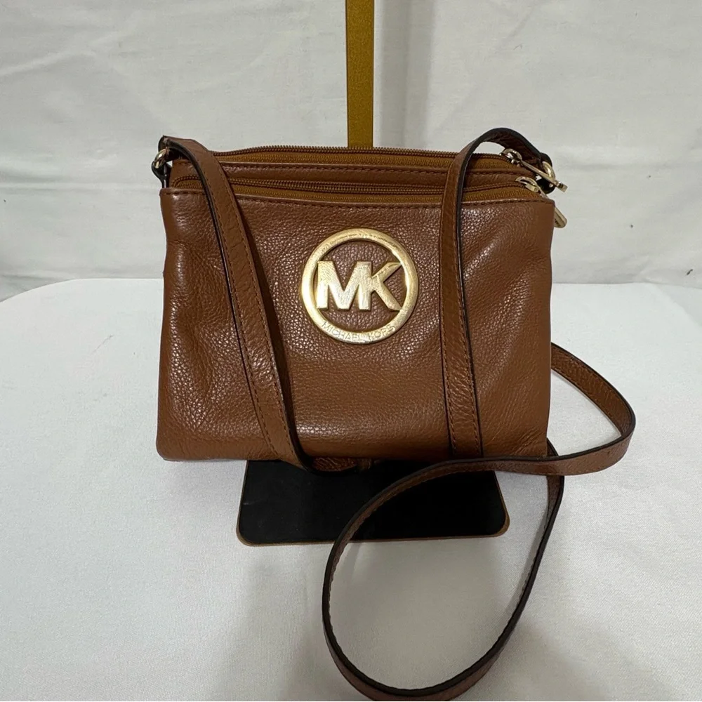 Michael Kors brown leather crossbody bag with gold-tone hardware